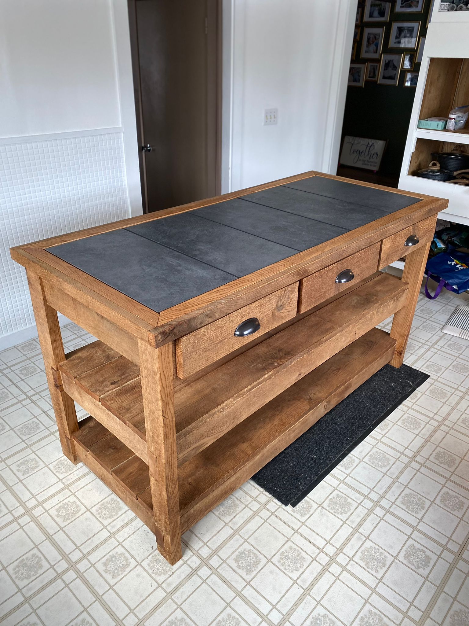 Custom kitchen island crafted by Grenier's Woodworking