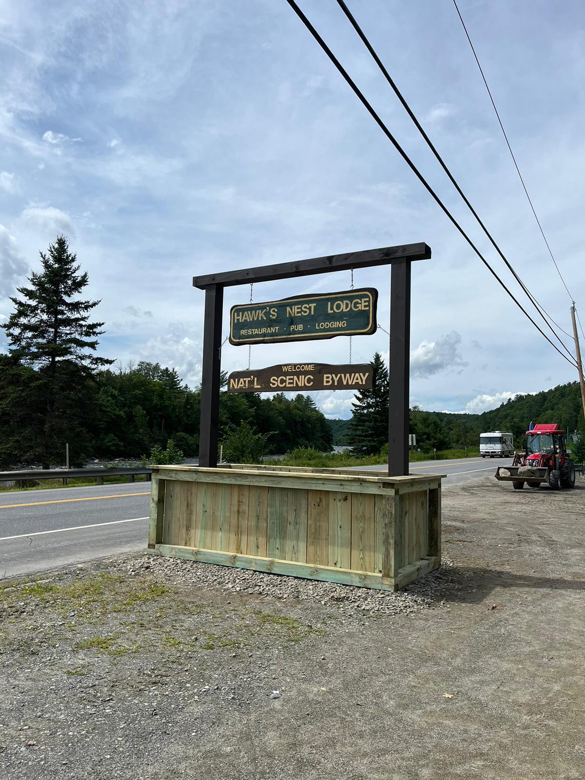 Custom wooden business signage for Hawk's Nest Lodge