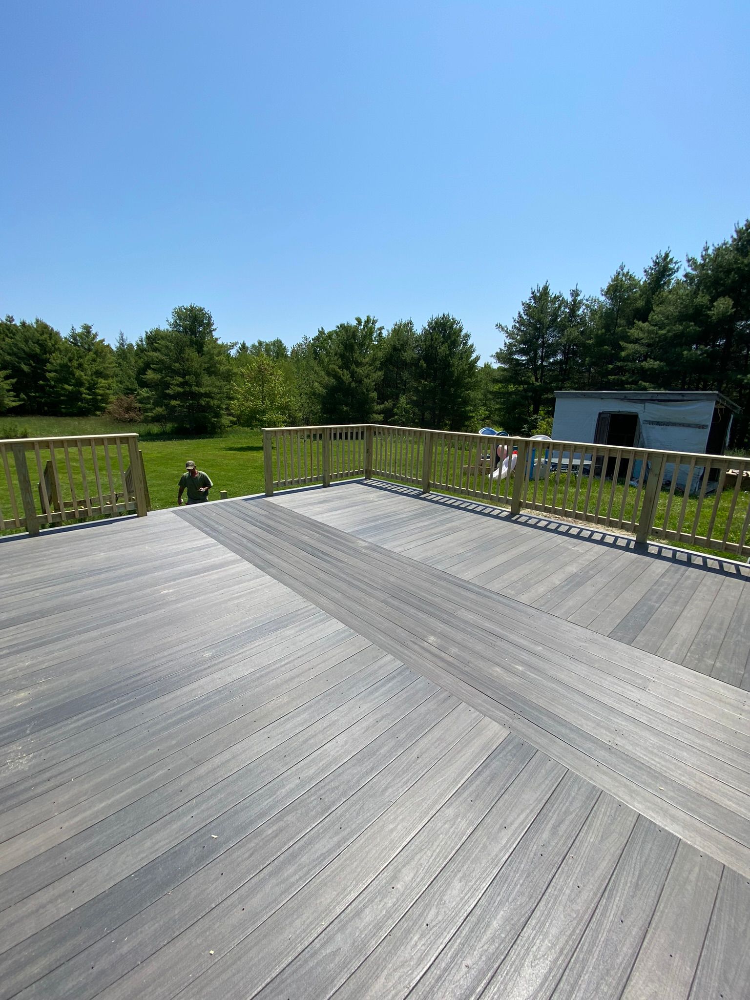 Multi-level deck with professional railings and angled decking patterns