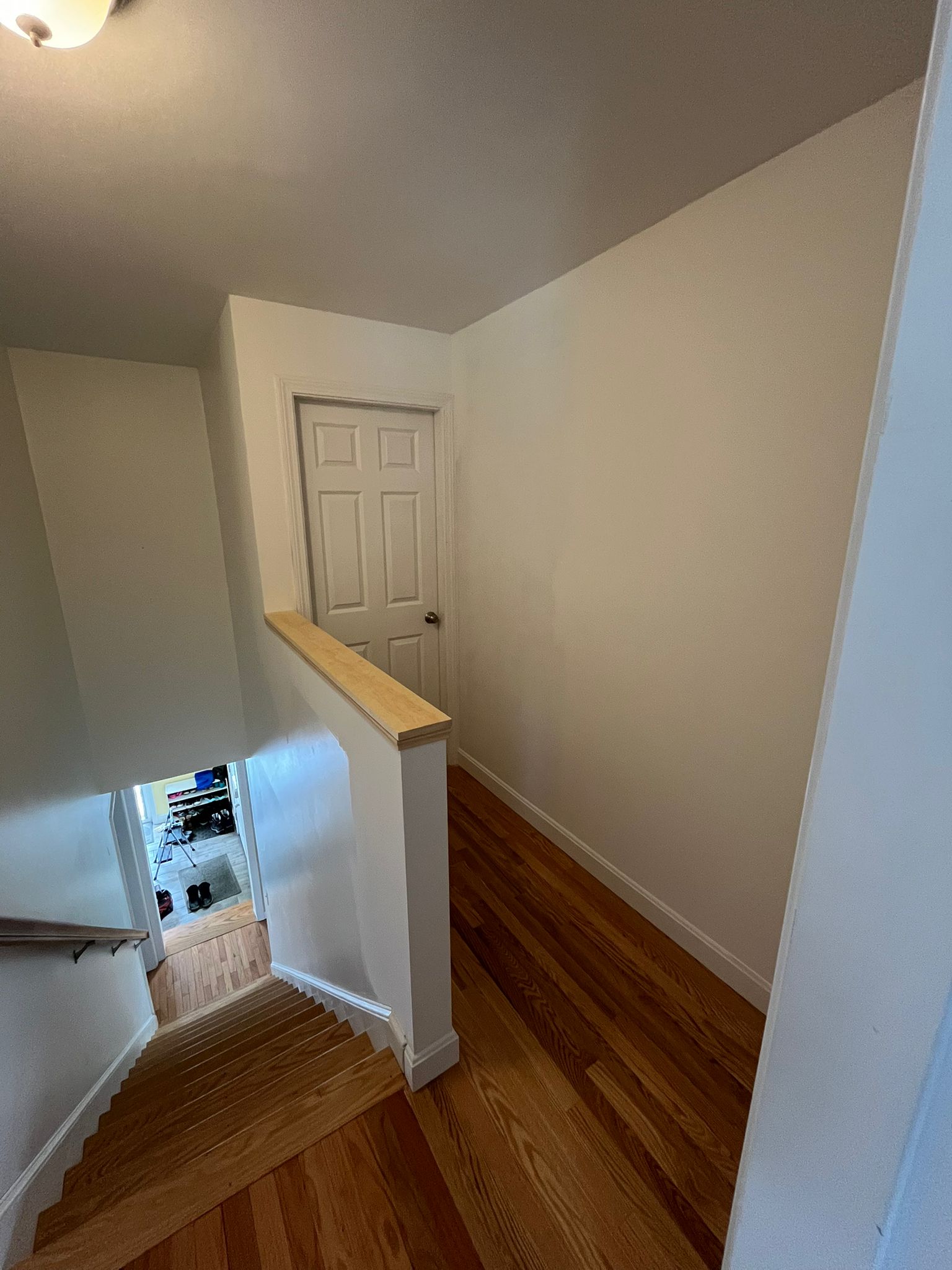 After - Finished interior with beautiful wood floors and clean lines